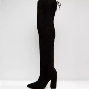 Pointed knee high boots
